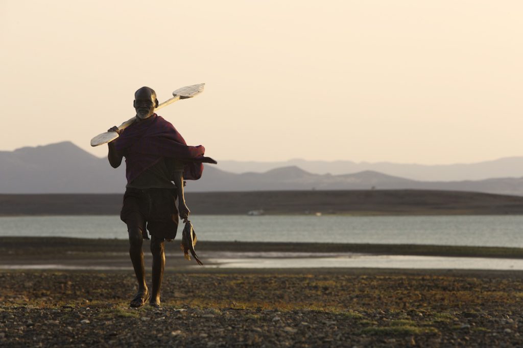 fisherman returning form a day of fishing on Lake Turkana, Northern Kenya