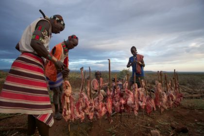 Goat roasting with the hamar tribe at a bull jumping celebration in the omo valley