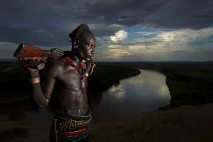 Tribes of the Omo Valley, Hamar warrior on the Omo River