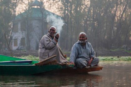 Men Having a Smoke on their Shikaras